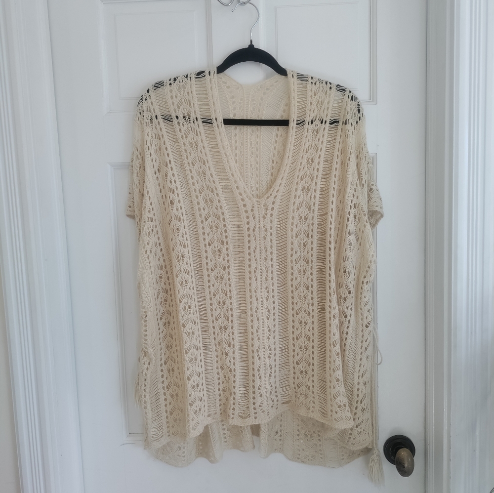 Woman's bohemian tie knit swimsuit coverup perfect for pool or beach